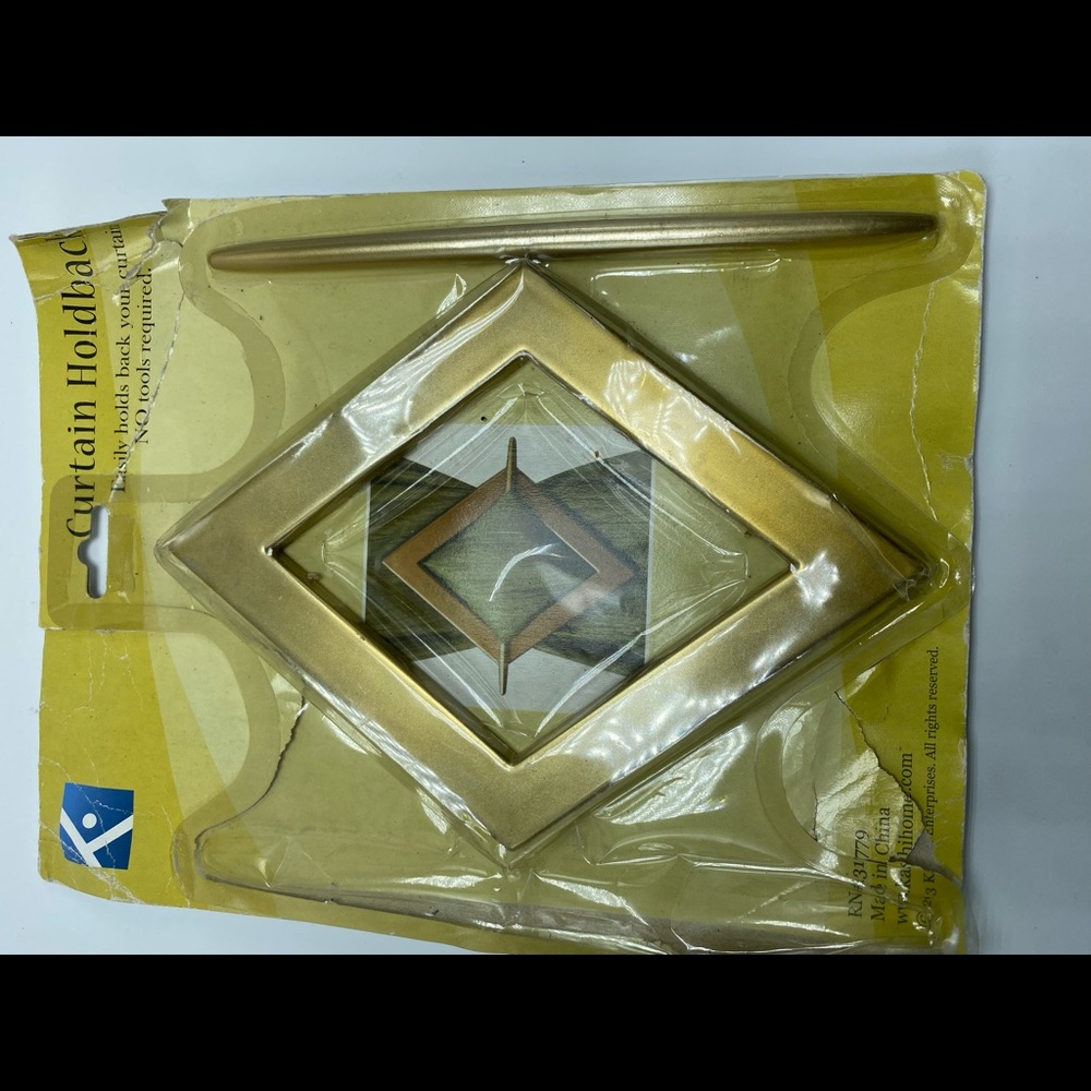Curtain hold back